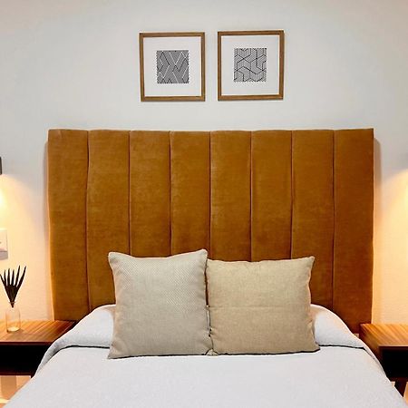 Suites Ciento 37 เลออน ภายนอก รูปภาพ