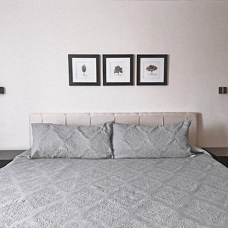Suites Ciento 37 เลออน ภายนอก รูปภาพ