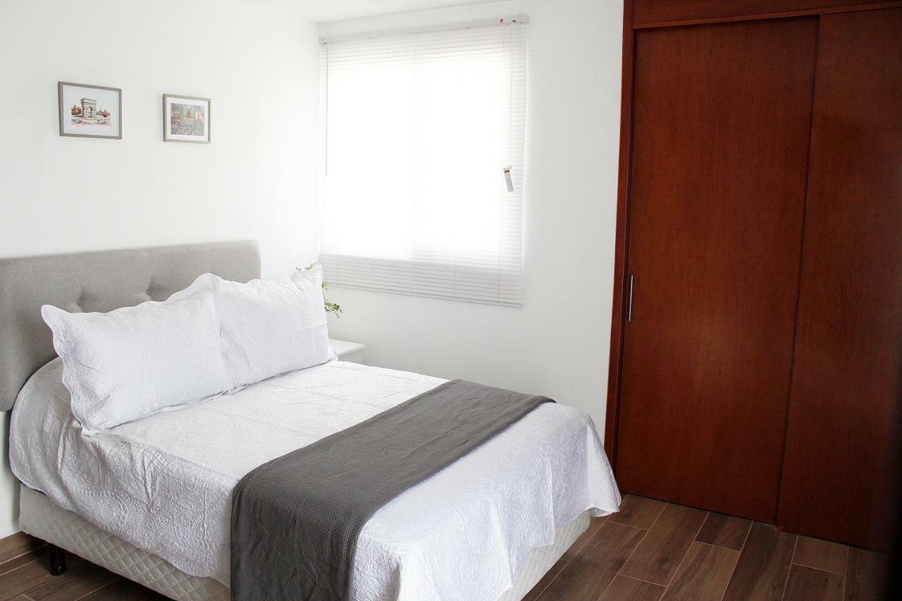Suites Ciento 37 เลออน ภายนอก รูปภาพ
