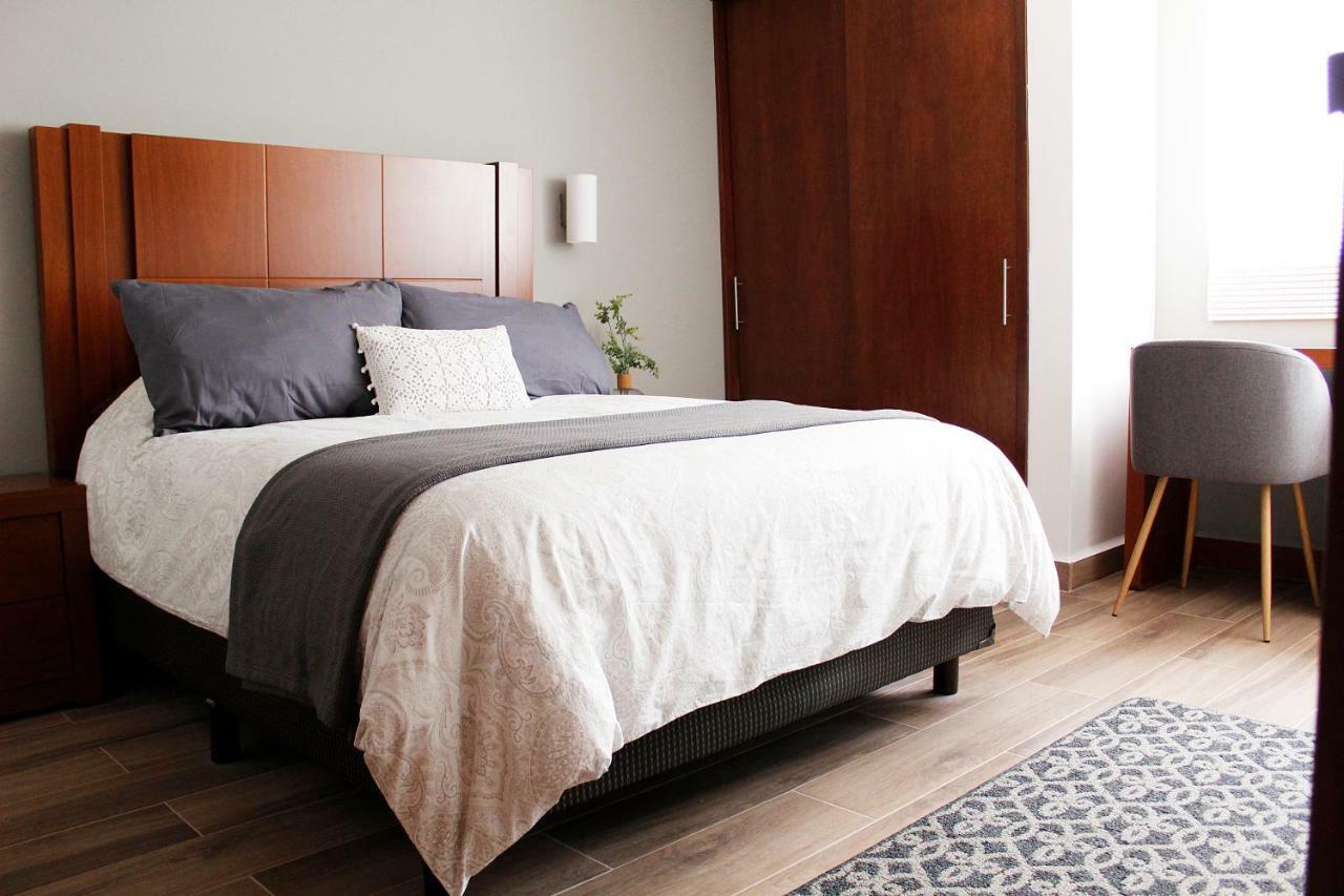 Suites Ciento 37 เลออน ภายนอก รูปภาพ