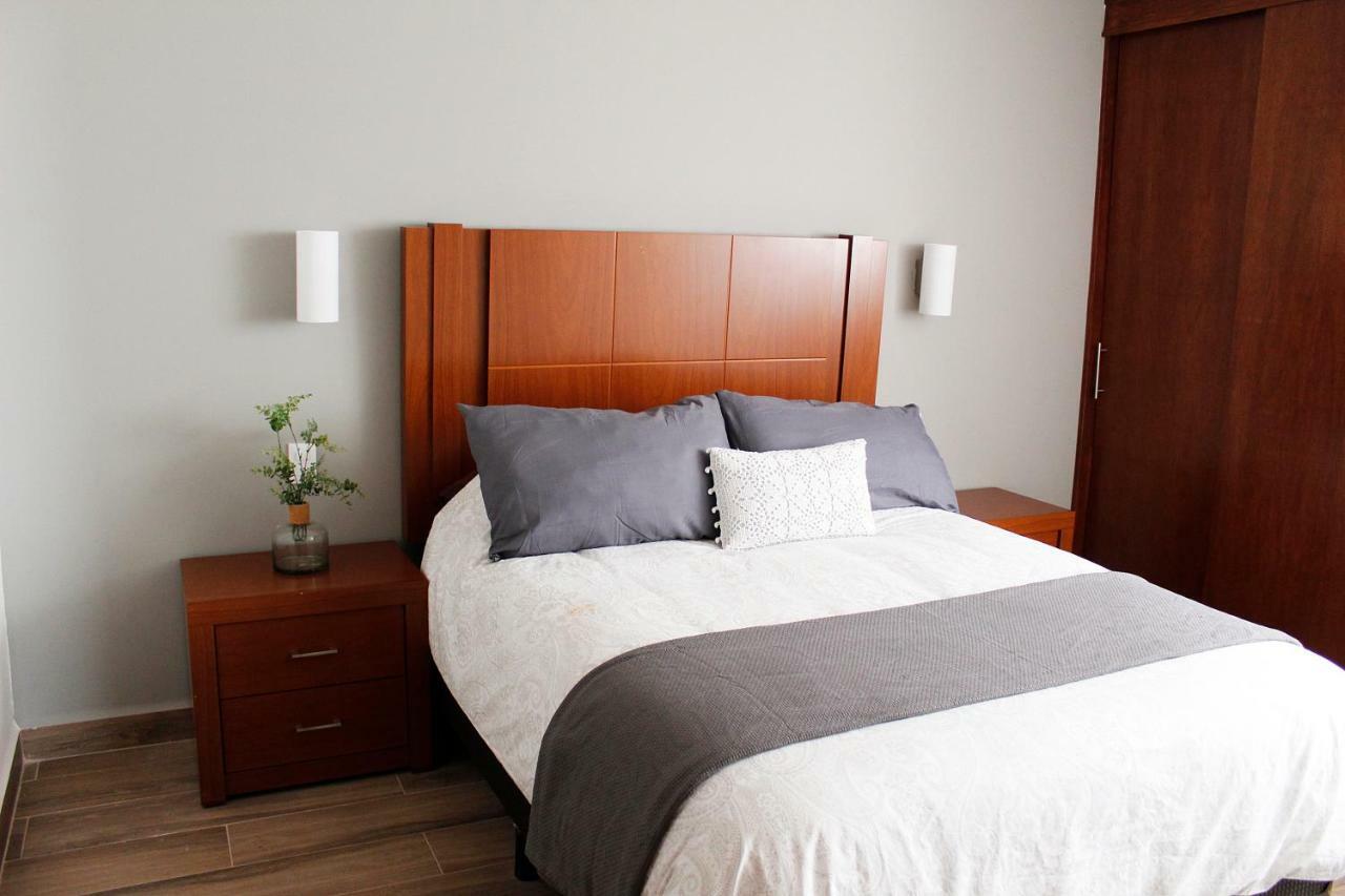 Suites Ciento 37 เลออน ภายนอก รูปภาพ