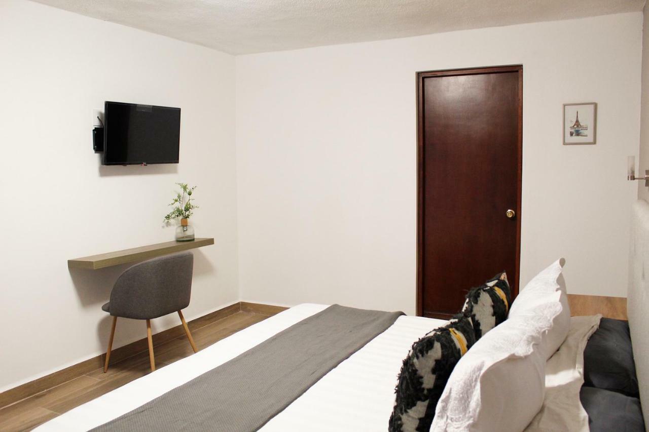 Suites Ciento 37 เลออน ภายนอก รูปภาพ