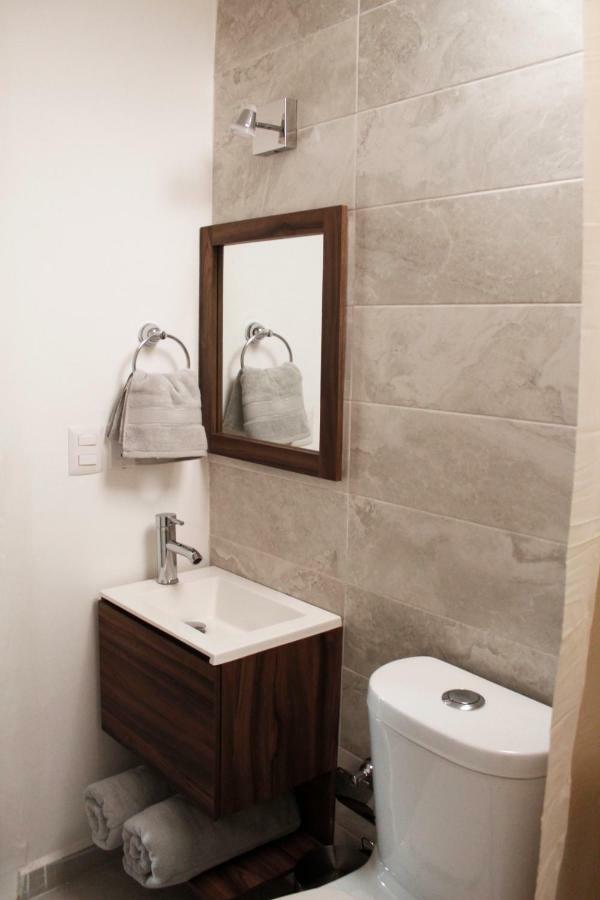 Suites Ciento 37 เลออน ภายนอก รูปภาพ