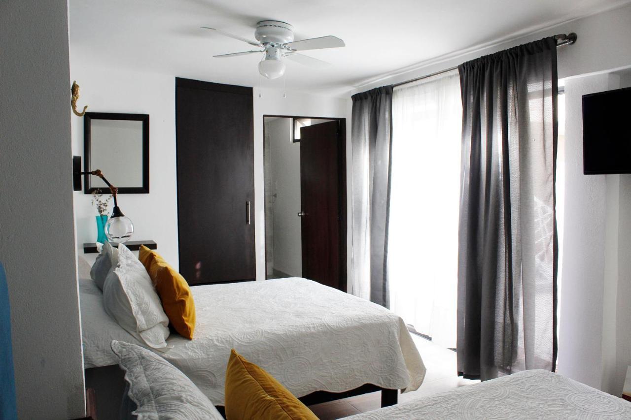 Suites Ciento 37 เลออน ภายนอก รูปภาพ