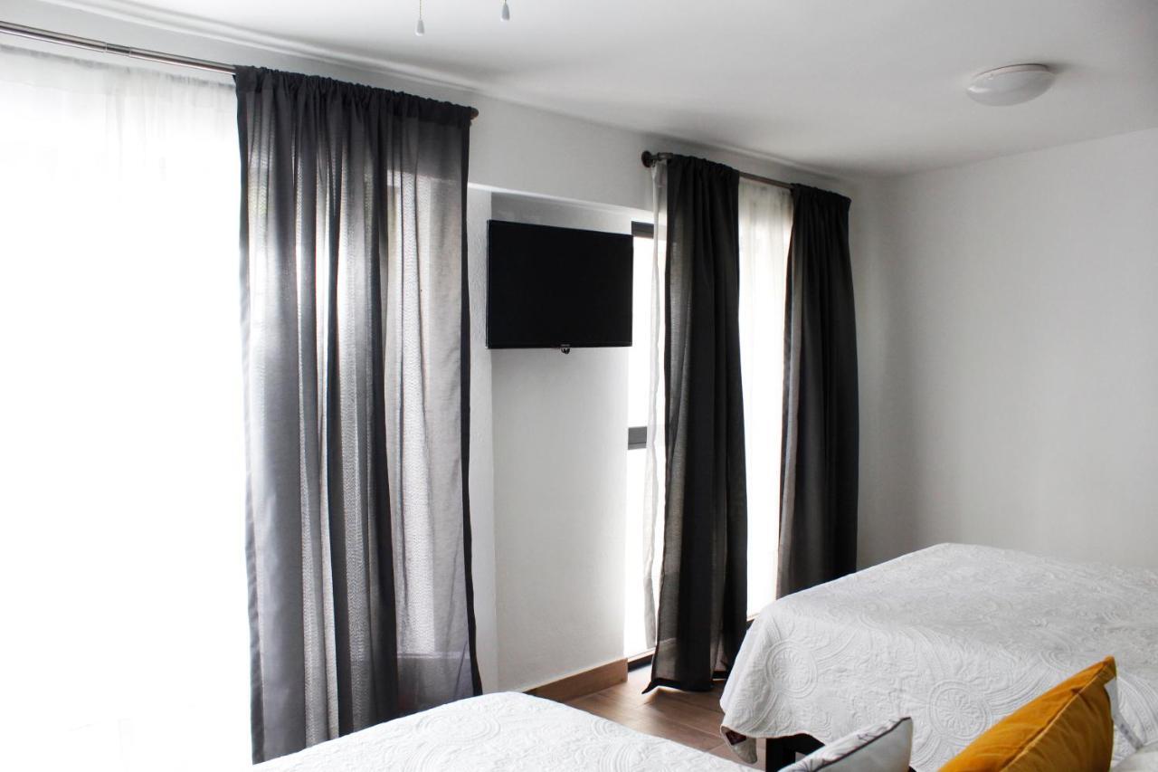 Suites Ciento 37 เลออน ภายนอก รูปภาพ