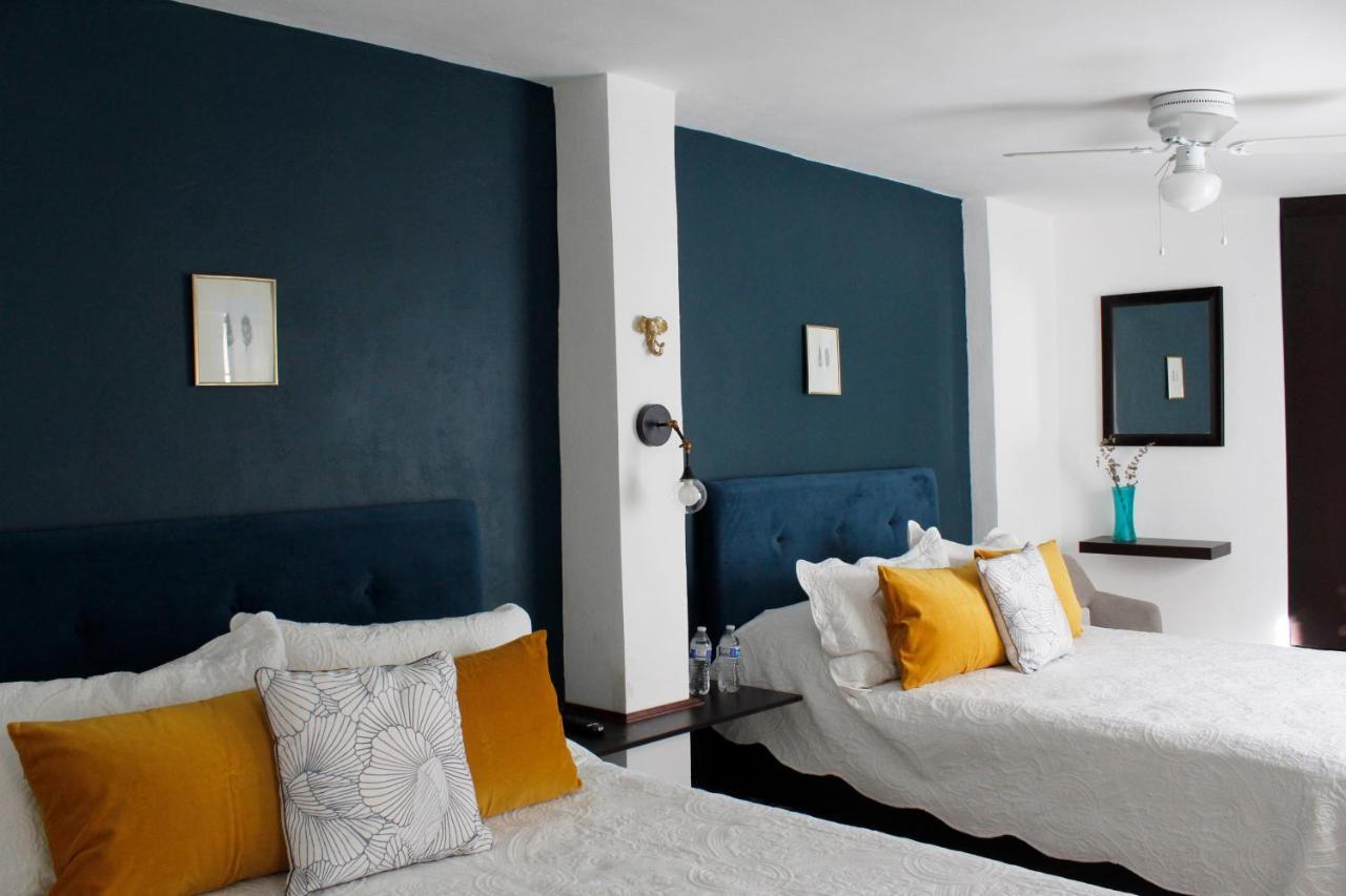Suites Ciento 37 เลออน ภายนอก รูปภาพ