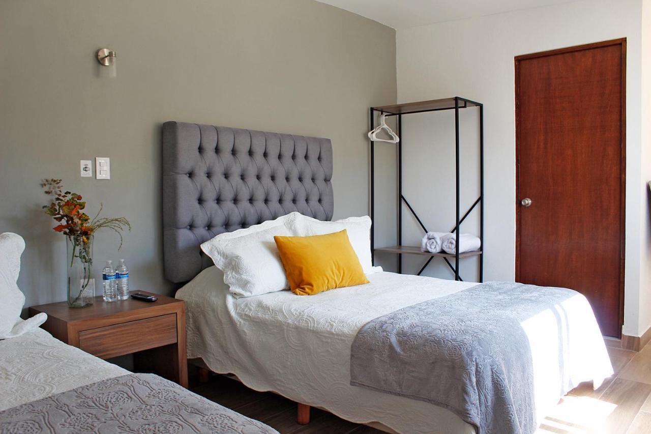Suites Ciento 37 เลออน ภายนอก รูปภาพ