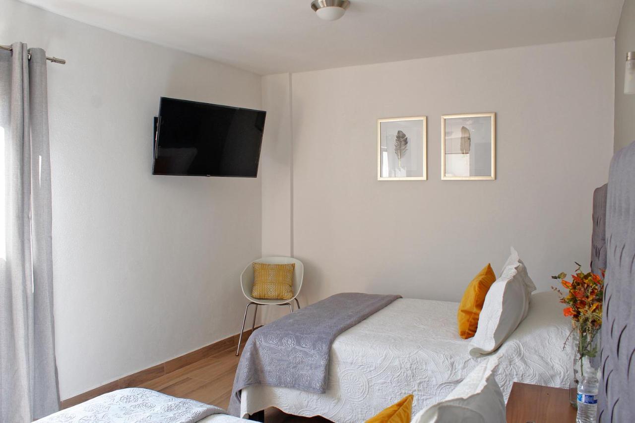 Suites Ciento 37 เลออน ภายนอก รูปภาพ