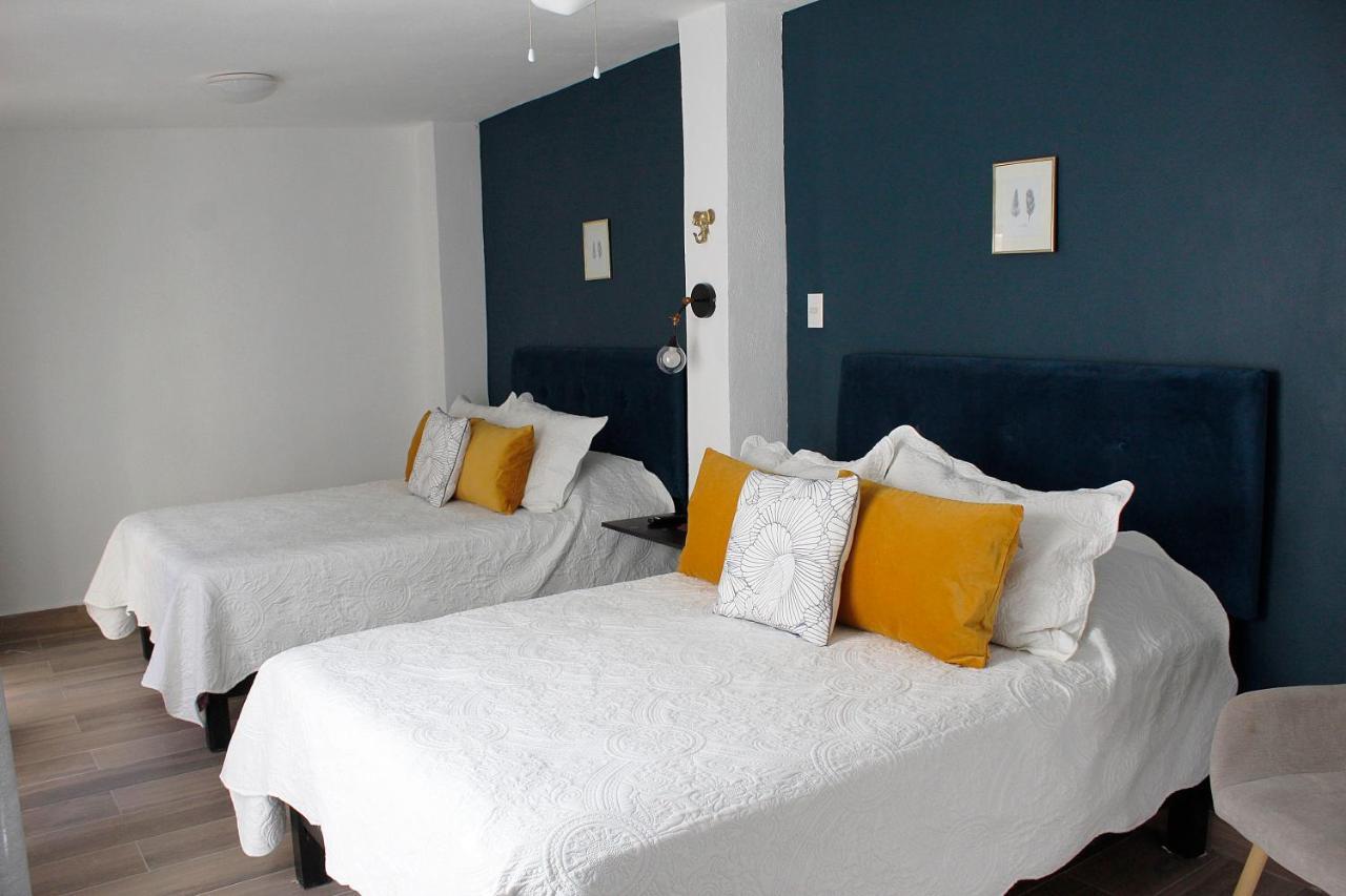 Suites Ciento 37 เลออน ภายนอก รูปภาพ